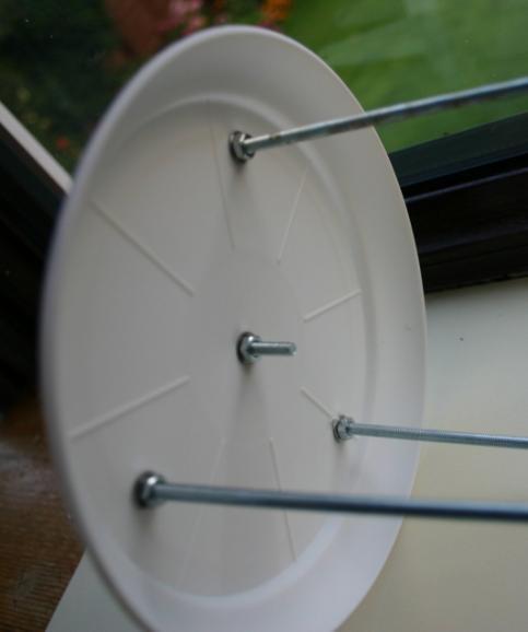 In this example a simple shelf bracket is used. This shows the prepared top saucer.