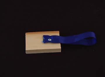 It s a simple dowel with a handle block and very important wrist strap for safety. 1.