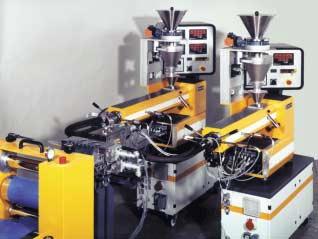 This can be effected by: Weighing the extruder output Gravimetric feeding (loss in weight) Use of melt pumps between the extruder and die A system with gravimetric feeding is shown in the photograph