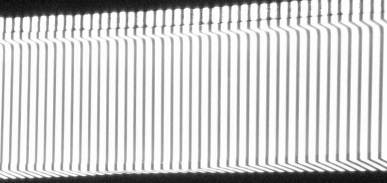 TOP FLANGE WEB UNDERSIDE OF BOTTOM FLANGE Figure 17. Damaged Aluminum I-beam with fringe pattern projection demonstrating distortion of fringes.