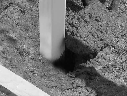 Install the stair rail section. Step 3: Check the height and fill the hole with concrete until it is approximately 2" from the top of the hole.