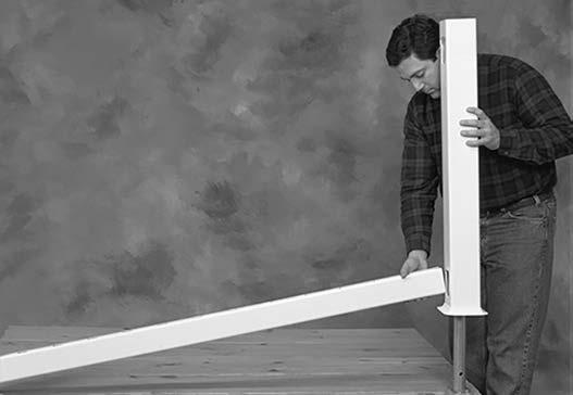 INSTALL RAILING SECTIONS Step 1: Measure the rail by laying the bottom rail between the posts with both end holes