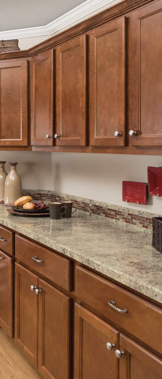 Auburn Maple AMERICAN MADE Vintage Maple This American made warm and classic kitchen combines the hand-wiped yet durable finish of our fully-assembled cabinetry with special touches like crown