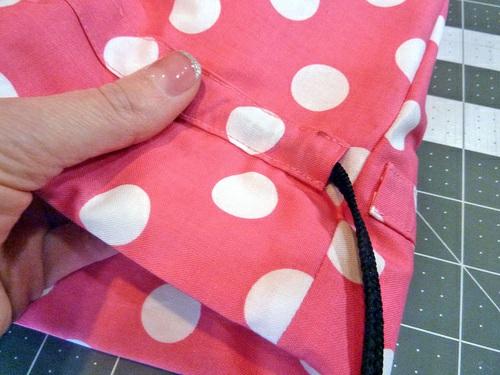 You now have both tails on one side and can cinch the bag closed and tie a pretty bow. Trim the tails to your desired length if need be.