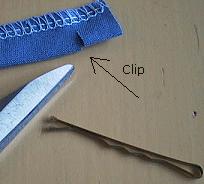 Trim seam allowances. Fold hem allowance to the wrong side of the garment and sew from right side with 3-stitch zigzag and trim seam allowance. 4.