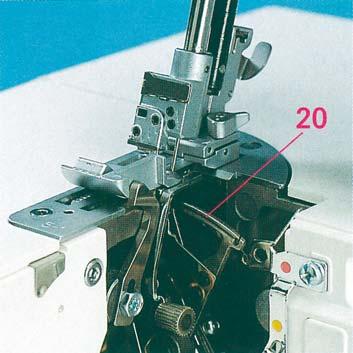 Threading the two thread chainstitch looper and cover stitch looper (violet) for