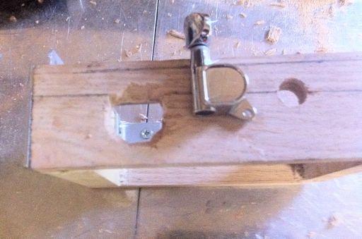 This piece, and the cabinet handle will serve as the bridge.