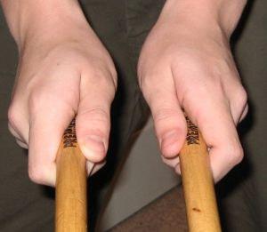 15 of 41 10/30/2007 9:08 AM Matched: The matched grip is performed by gripping the drum sticks with one's index finger and middle finger curling around the bottom of the stick and the thumb on the