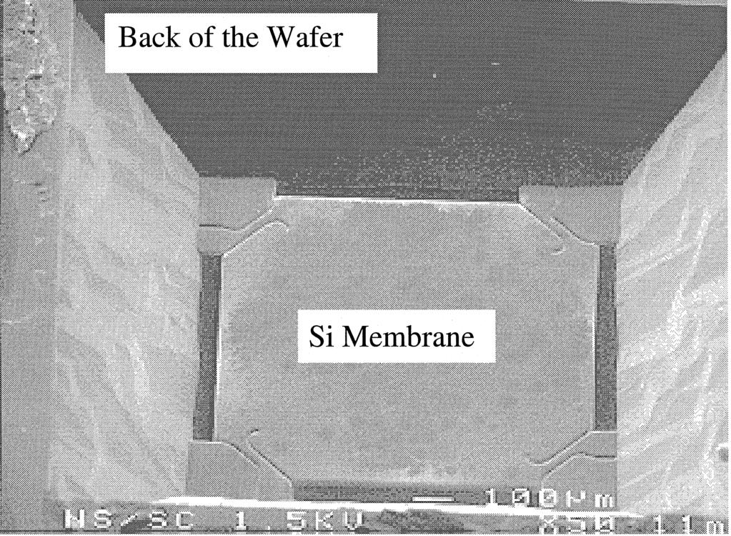 After plating, another layer of thick photoresist was spun on the front of the wafer and the oxide from the back was etched away completely by a buffered hydrofluoric acid solution.