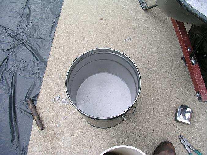 Next the refractory was mixed up. I was told to make a dry mix by the fellow who sold it. Don t mix it wet like concrete because there is a chemical binder that will separate with to much water.