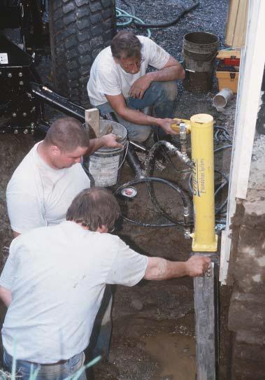 RESCUING FIXING A A Block Foundation Hydraulically driven piers provide bearing for a settling foundation From the 1950s through the 80s before poured concrete became the norm many homes in northern