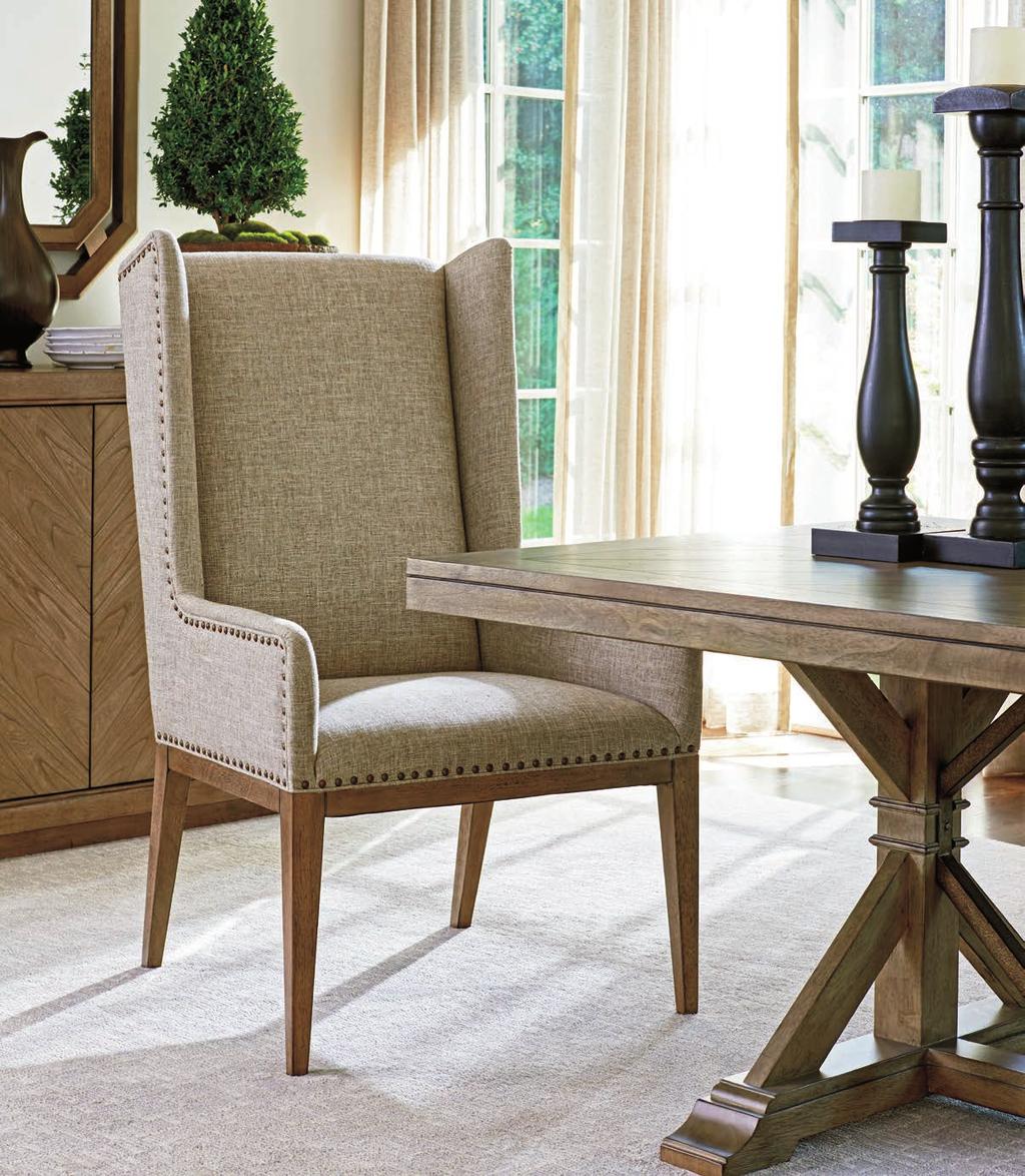 The Devereaux arm and side chairs offer a beautifully tailored look for the dining room.