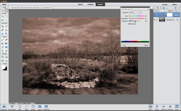 (If the layers palette isn t visible, go to Window and click Layers from the drop down menu.) Create an adjustment layer to add a color tint to the black and white image.