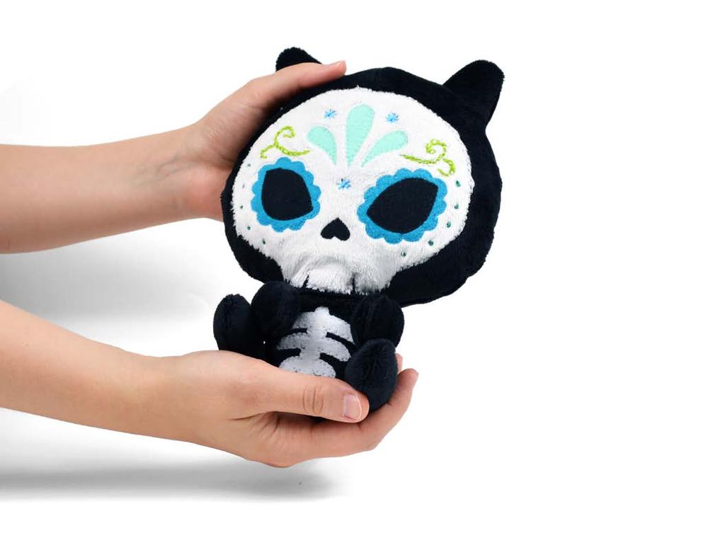 sugar skull kit ty plush This pattern pays homage to the beautiful calaveras seen in Dia de Muertos art. It s a simple kitty plush with button jointed limbs and an ornate sugar-skull mask.