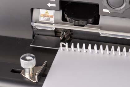 Ensure that the Power Crimper Edge Guide is set so that the end of document (last punched hole) lines