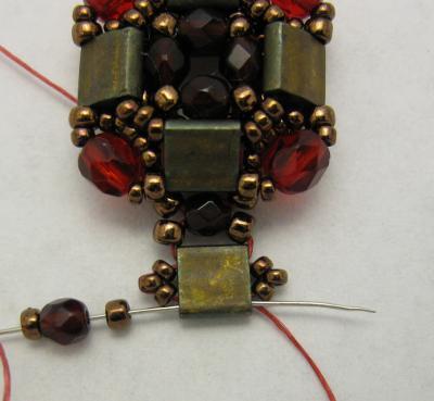 from. Pass through all beads added in this step and the tila to