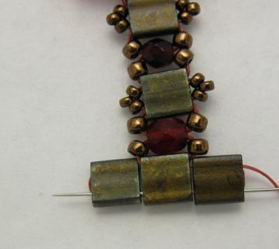 Pick up another 3 copper 11/0 beads; pass through the