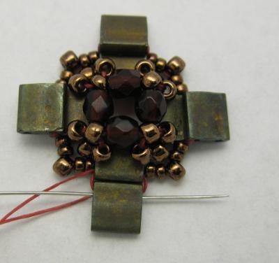 bead, 1 copper 15/0 and 1 copper 11/0.