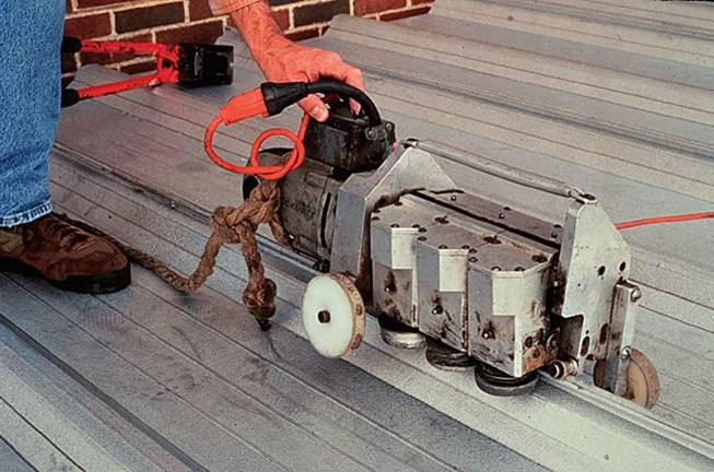 Figure 5-14 Nested Side Lap Joint In the early days of metal roofing, side-toside joining was accomplished by bending and folding the panel edges in the field.
