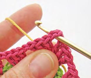 Step 1: Hold new yarn at the back of the