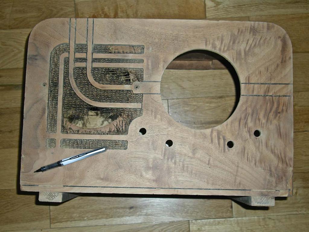There were several steps to re-facing the body of this radio. The veneers were broken and chipped in many areas.