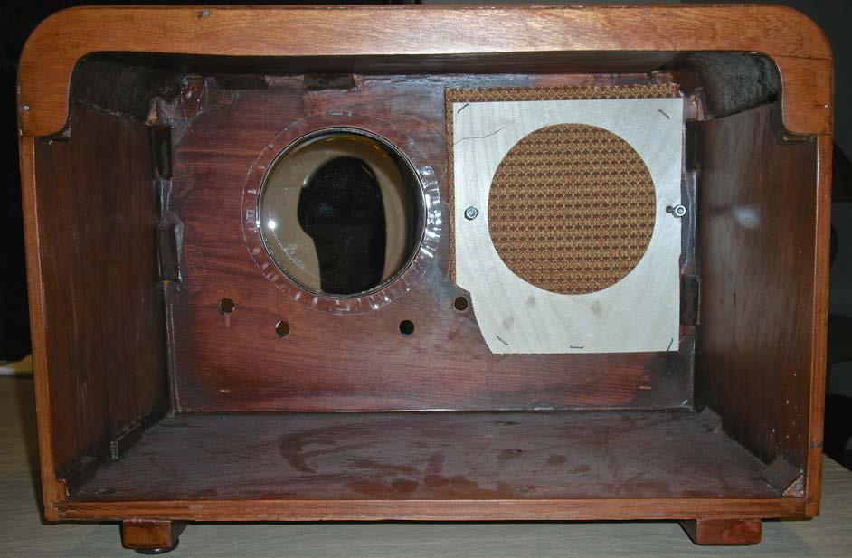 The speaker grill cloth was attached to a thin plywood backer-board with spray adhesive.
