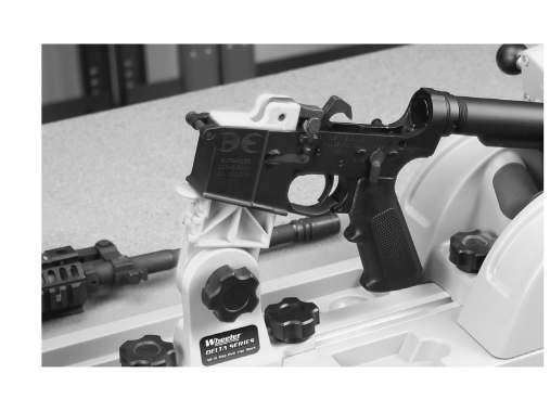HAMMER STOP FUNCTION: AR-15 Mag well Vise Block The Vise Block includes a Hammer Stop to protect the lower receiver while dry firing.