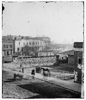 [Conway, 2010] Discovering and Storytelling [P1] Sullivan. Atlanta, Ga. Soldiers on boxcars at railroad depot, 1865. http://hdl.loc.