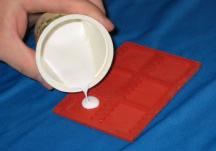 Lay the mould on a flat surface covered by newspaper, paper towels, or other suitable foundation. Mixing the Plaster 1.