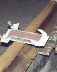 (Note: The mould must fit over the locating dowel in the mould jacket.) 4. Fit the base plate of the mould into the steel base plate.