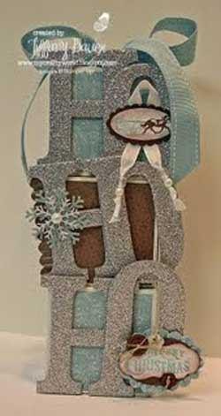 Project name: HO HO HO Blocks Stamps: Yuletide Christmas Ink: Chocolate Chip & Baja Breeze Classic Ink Paper: Ski Slope DSP Accessories: Décor Elements Décor Blocks, Baja Breeze 1 Double-Stitched