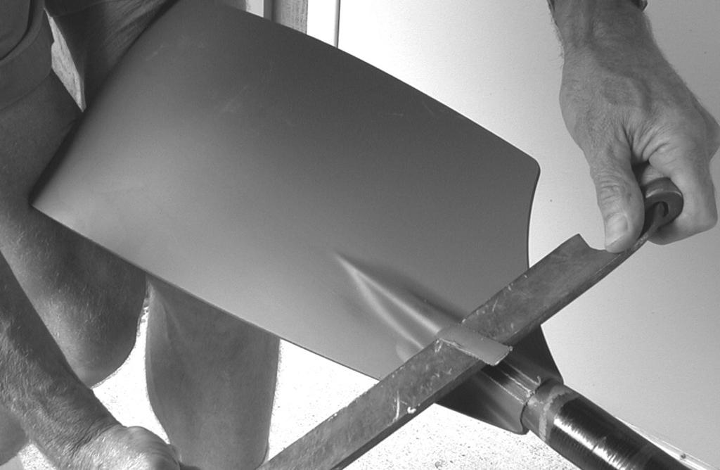 Apply heat to the blade where the shaft comes into the blade for approximately three minutes.