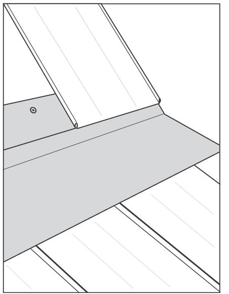 TRIM INSTALLATION CONCEALED FASTENER TRANSITION TRIM 1. Install standing seam panels on the lower roof surface. 2. Run a line of butyl sealant tape across the upper edge of each standing seam panel.