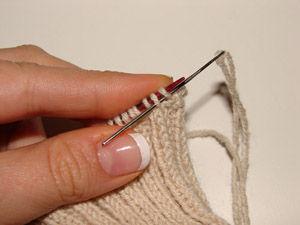 Then slip this last stich onto the other needle, and continue the