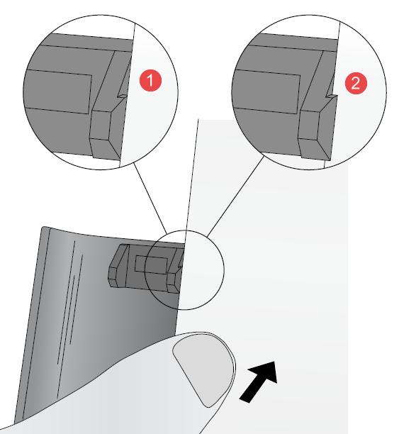 Simply load the paper as described above and push it past the paper stop on the guide as shown below.