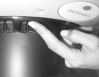 Grasp a PSP by long edges between the thumb and index finger of your hand. See Figure 6 below.