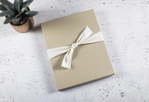 Your customer will receive their order packaged in a black box, secured with a tied silver ribbon. Executive Packaging $4.