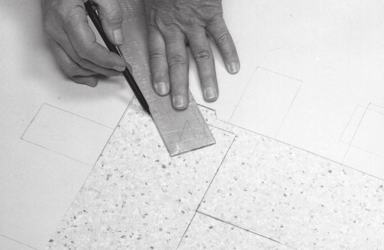 Repeat the process for the other side of the corner. Lay template #2 on the two lines and draw around it with a pencil. This will mark the inside corner (Fig. 10).