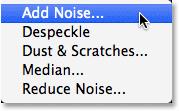 Go up to the Filter menu at the top of the screen, choose Noise, then choose Add Noise: Going to Filter > Noise > Add Noise. Photoshop pops open the Add Noise dialog box.