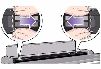 Press down on the platen as you pull the left and right sliders towards the scanner s center until the metal safety