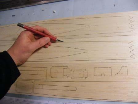 FUSELAGE CONSTRUCTION 1) Locate the laser cut fuselage sides and cut tags to