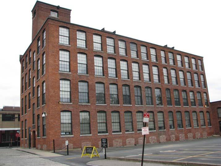 Caption: The former mill of the United States Worsted Company, called the Musketaquid Mills, is one of the few surviving textile mills in Lower Belvidere.