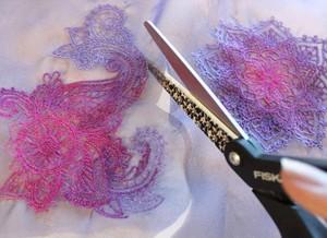Once it s stitched, carefully snip away as much of the excess stabilizer as possible, and then soak it according