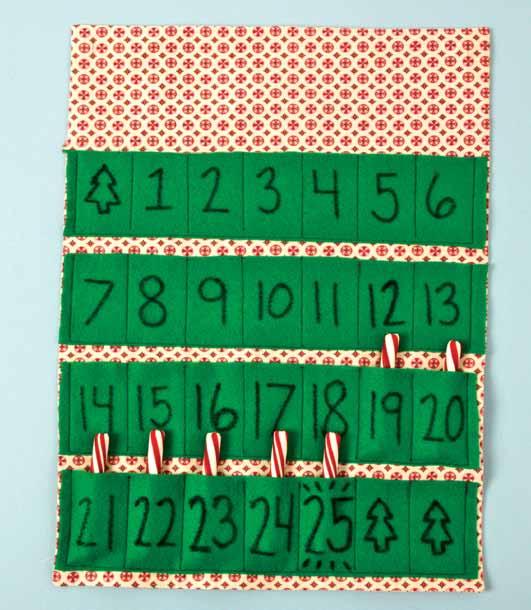 Countdown Calendar Two 15 1 4 x20 rectangles of print cotton fabric 15 1 4 x20 rectangle of lightweight fusible interfacing Four 3 x14 1 4 strips & scraps of felt Contrasting thread, embroidery floss