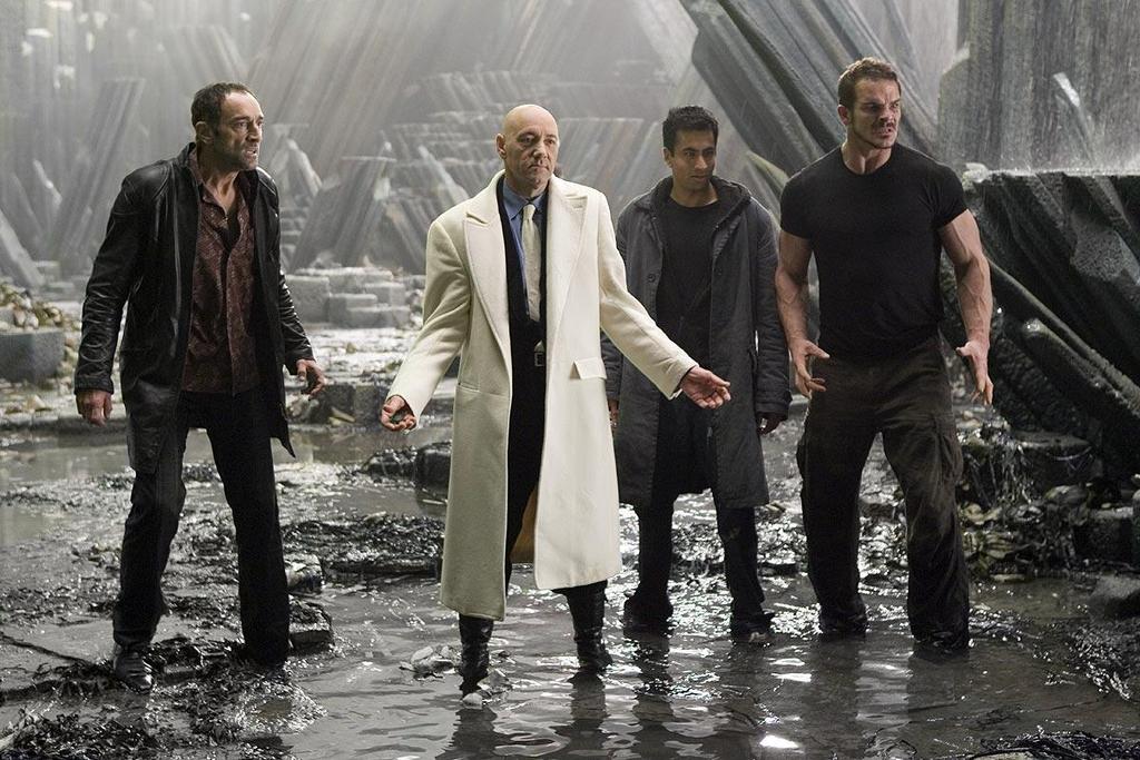 Lex Luthor (KEVIN SPACEY, second from left) prepares his cohorts (left to right)
