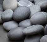 Decorative s heat-resistant natural basalt volcanic stones are sorted by hand for