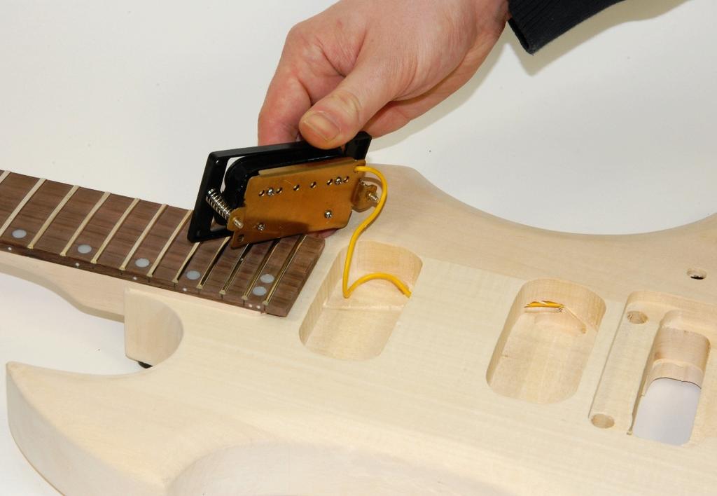 Assembling of the hardware and the tuner mechanics If the guitar finish has been done completely the