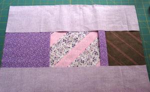 Stitch the front and back panels together at the side seam.
