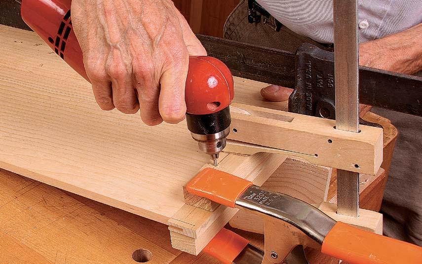 Then put the keeper in the slot, push it up against the drawer back, and screw it into place. Pull the drawer open to be sure it extends fully.