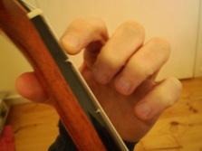 Your finger should now be pressing low F. Try not to press down too hard on the string. As you lift your finger off see if you can make a sound.